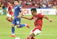 Timnas Indonesia sedang melawan Timnas Thailand di final leg pertama Piala AFF 2020.